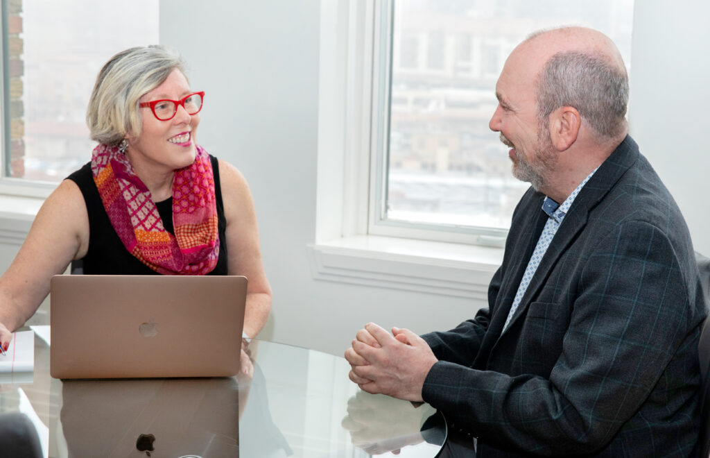 A death doula talking with a man