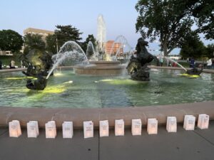 Memorial lighted bags around the fountain in Mill Creek Park