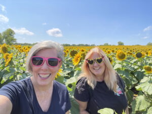 With my sister in a field of sunflowers